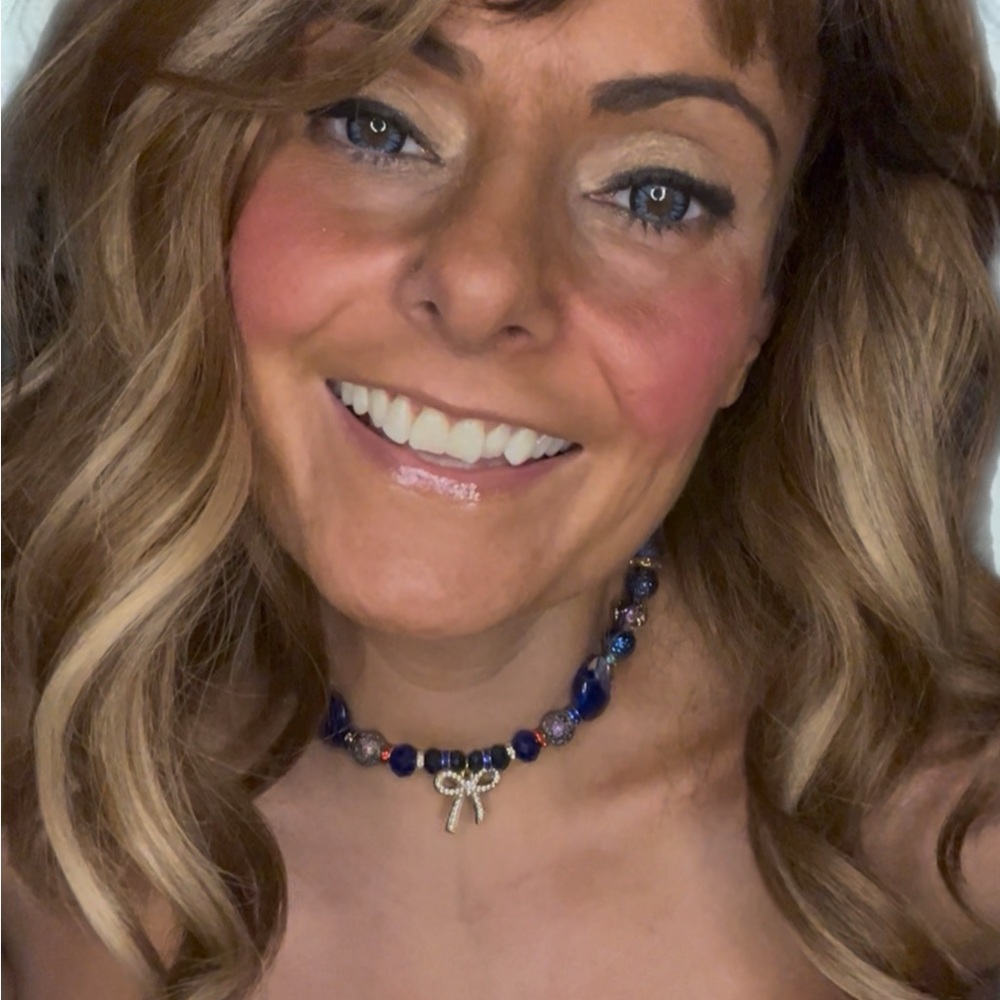 Blue Beaded Necklace with Golden Bow